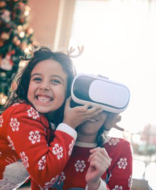 Two Little Sisters Playing and Fighting over Virtual Reality Simulator